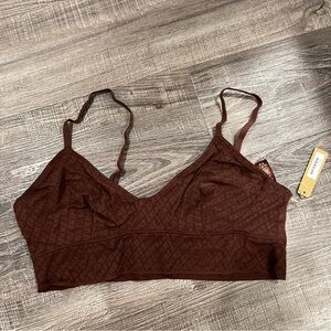 SKIMS logo triangle bralette